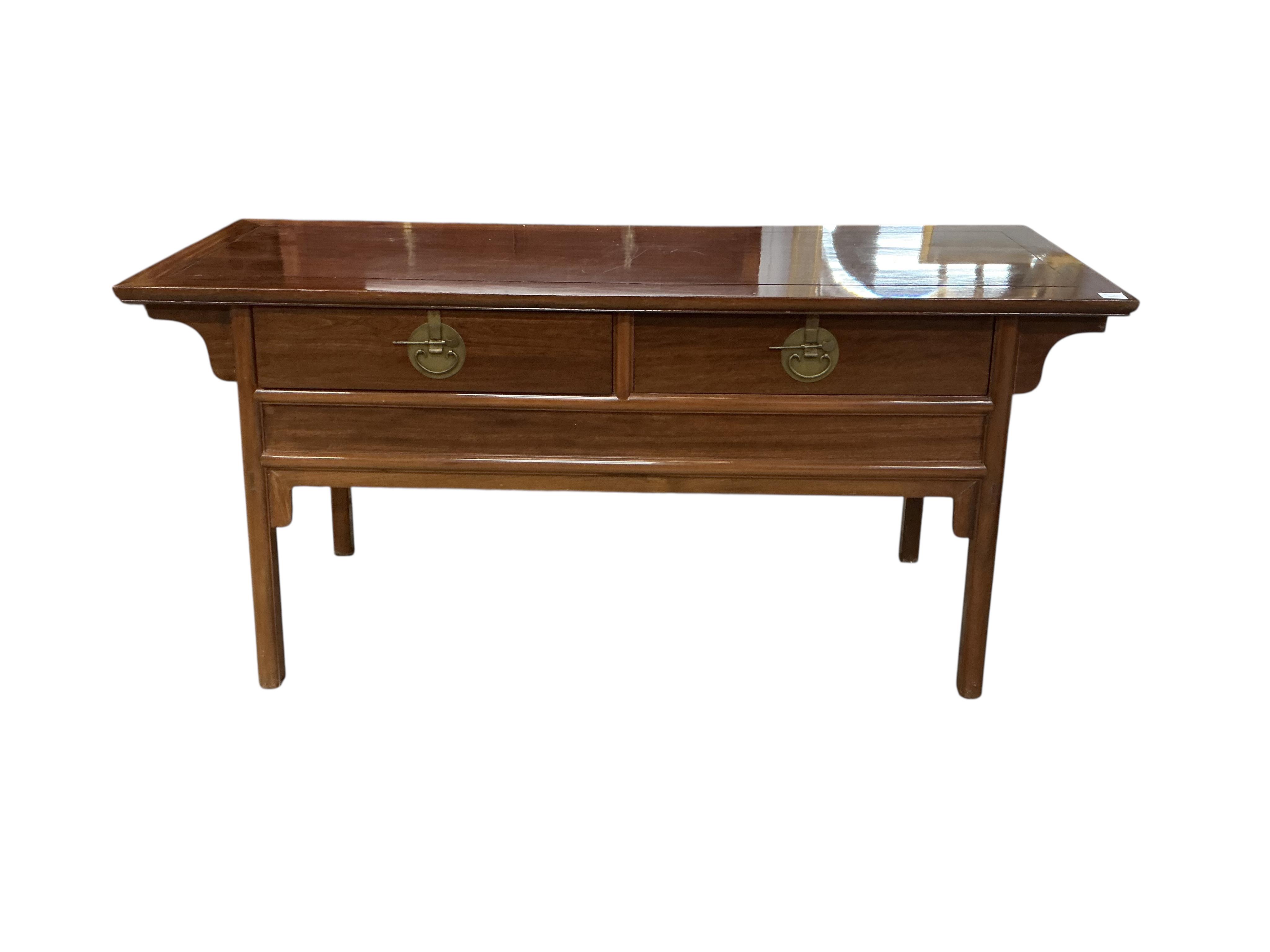 A Chinese hardwood two drawer serving table, width 172cm, depth 61cm, height 82cm